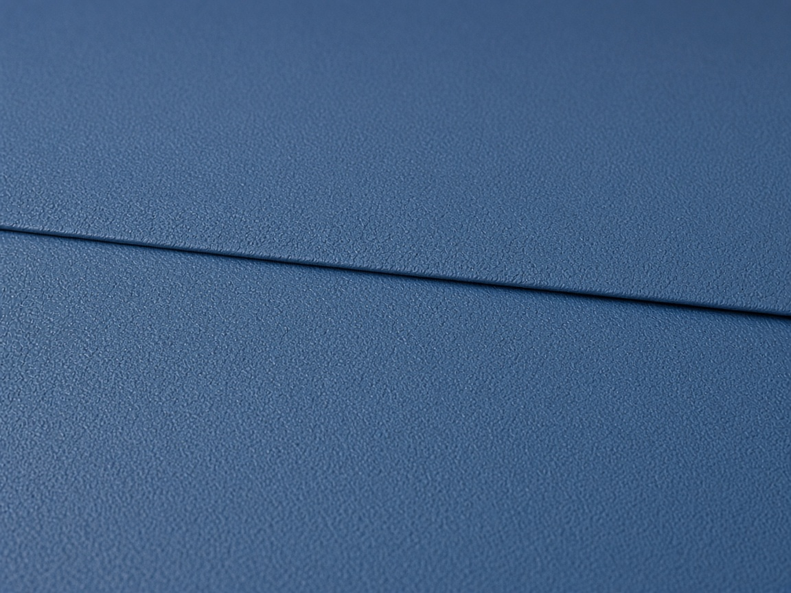 Blue synthetic sport surface with a seam